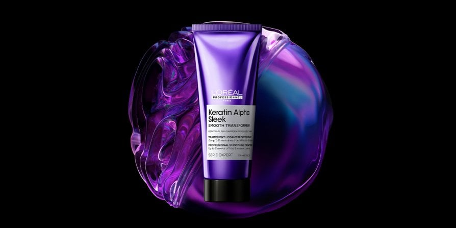 Packshot of Alpha Sleek Keratin Smooth on a textured background, highlighting keratin as the key ingredient of the hair treatment.