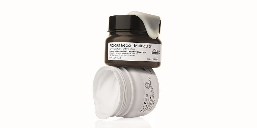 Packshot of L’Oréal Professionnel Absolut Repair Molecular Mask, designed for damaged to very damaged hair, helping reduce breakage and restore strength.