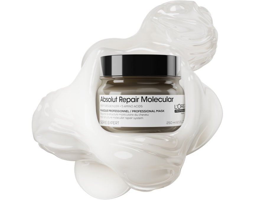 Packshot of L’Oréal Professionnel Absolut Repair Molecular hair mask on a textured background, highlighting its peptide complex to restore damaged hair.