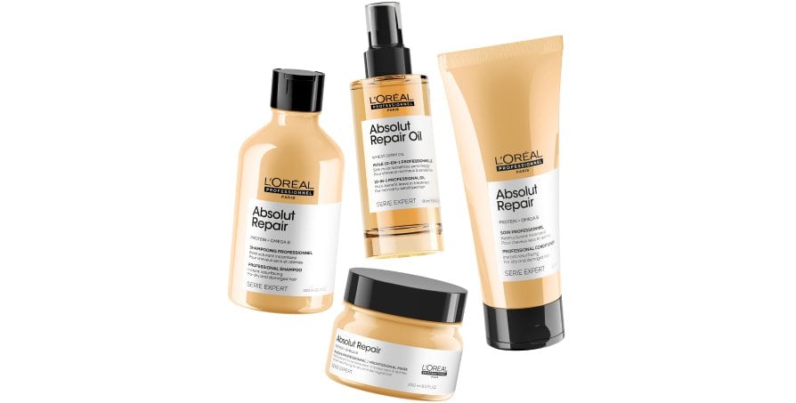 Hydrating hair care routine for dry hair featuring Absolut Repair shampoo, conditioner, mask, and oil to restore softness, strength, and shine.