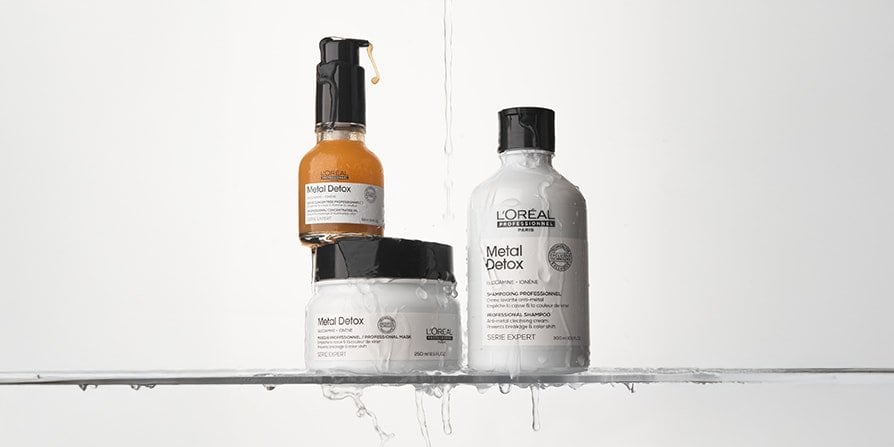 Packshot of Metal Detox hair care with shampoo, mask, and serum, designed to protect hair and help prevent split ends for smoother lengths.